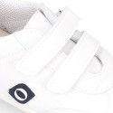 White color OKAA FLEX tennis kids shoes laceless and with zero drop.