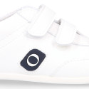 White color OKAA FLEX tennis kids shoes laceless and with zero drop.