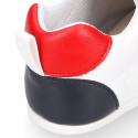 White color OKAA FLEX tennis kids shoes laceless and with zero drop.