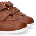 Tan color OKAA FLEX tennis kids shoes laceless and with zero drop.