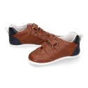 Tan color OKAA FLEX tennis kids shoes laceless and with zero drop.