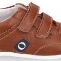 Tan color OKAA FLEX tennis kids shoes laceless and with zero drop.