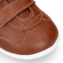 Tan color OKAA FLEX tennis kids shoes laceless and with zero drop.