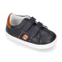 Navy blue color OKAA FLEX tennis kids shoes laceless combined with tan color.