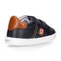 Navy blue color OKAA FLEX tennis kids shoes laceless combined with tan color.