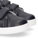 Navy blue color OKAA FLEX tennis kids shoes laceless combined with tan color.