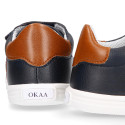 Navy blue color OKAA FLEX tennis kids shoes laceless combined with tan color.