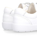 White Washable leather kids School sneakers shoes laceless and with reinforced toe cap.