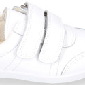 White Washable leather kids School sneakers shoes laceless and with reinforced toe cap.