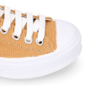 TAN color Cotton canvas OKAA Sneaker shoes with shoelaces and toe cap.