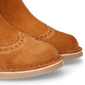 Suede leather ankle boots with elastic band and chopped design in TAN color.