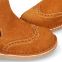 Suede leather ankle boots with elastic band and chopped design in TAN color.