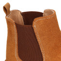 Suede leather ankle boots with elastic band and chopped design in TAN color.