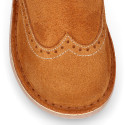 Suede leather ankle boots with elastic band and chopped design in TAN color.
