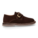 Suede leather Oxford shoes with buckle fastening for kids.