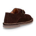 Suede leather Oxford shoes with buckle fastening for kids.