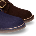 Suede leather Oxford shoes with buckle fastening for kids.