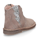 Suede leather Girl ankle boot shoes with elastic GLITTER design and zipper closure.