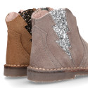 Suede leather Girl ankle boot shoes with elastic GLITTER design and zipper closure.