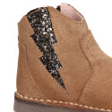 Suede leather Girl ankle boot shoes with elastic GLITTER design and zipper closure.