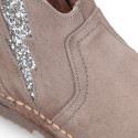 Suede leather Girl ankle boot shoes with elastic GLITTER design and zipper closure.