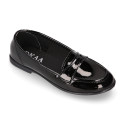 Stylized Girl OKAA Moccasin shoes in BLACK PATENT finish.