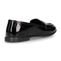 Stylized Girl OKAA Moccasin shoes in BLACK PATENT finish.