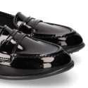 Stylized Girl OKAA Moccasin shoes in BLACK PATENT finish.