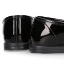 Stylized Girl OKAA Moccasin shoes in BLACK PATENT finish.