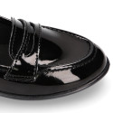 Stylized Girl OKAA Moccasin shoes in BLACK PATENT finish.