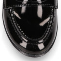 Stylized Girl OKAA Moccasin shoes in BLACK PATENT finish.