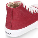 Cotton canvas High Sneaker shoes with shoelaces and with toe cap in BURGUNDY color.