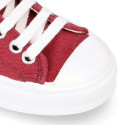 Cotton canvas High Sneaker shoes with shoelaces and with toe cap in BURGUNDY color.