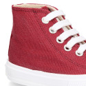 Cotton canvas High Sneaker shoes with shoelaces and with toe cap in BURGUNDY color.