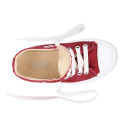 Cotton canvas High Sneaker shoes with shoelaces and with toe cap in BURGUNDY color.