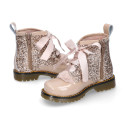 ROCK style patent leather kids boots with GLITTER and fur design and ties closure.