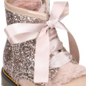 ROCK style patent leather kids boots with GLITTER and fur design and ties closure.