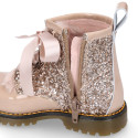 ROCK style patent leather kids boots with GLITTER and fur design and ties closure.