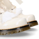 ROCK style patent leather kids boots with GLITTER and fur design and ties closure in IVORY color.