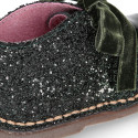Girl GLITTER and pearl patent leather safari boots with velvet ties closure.