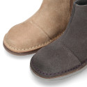 SHINY Suede leather kids ankle boot shoes with laminated waves and zipper closure.