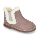 Suede leather kids ankle boot shoes with elastic and lining design in faux fur.