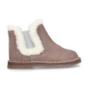 Suede leather kids ankle boot shoes with elastic and lining design in faux fur.