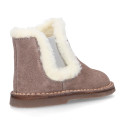 Suede leather kids ankle boot shoes with elastic and lining design in faux fur.