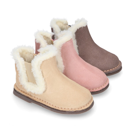 Suede leather kids ankle boot shoes with elastic and lining design in faux fur.