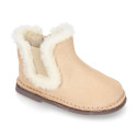 Suede leather kids ankle boot shoes with elastic and lining design in faux fur.