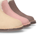 Suede leather kids ankle boot shoes with elastic and lining design in faux fur.