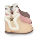 Suede leather kids ankle boot shoes with elastic and lining design in faux fur.