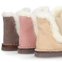 Suede leather kids ankle boot shoes with elastic and lining design in faux fur.