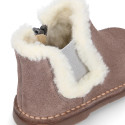 Suede leather kids ankle boot shoes with elastic and lining design in faux fur.